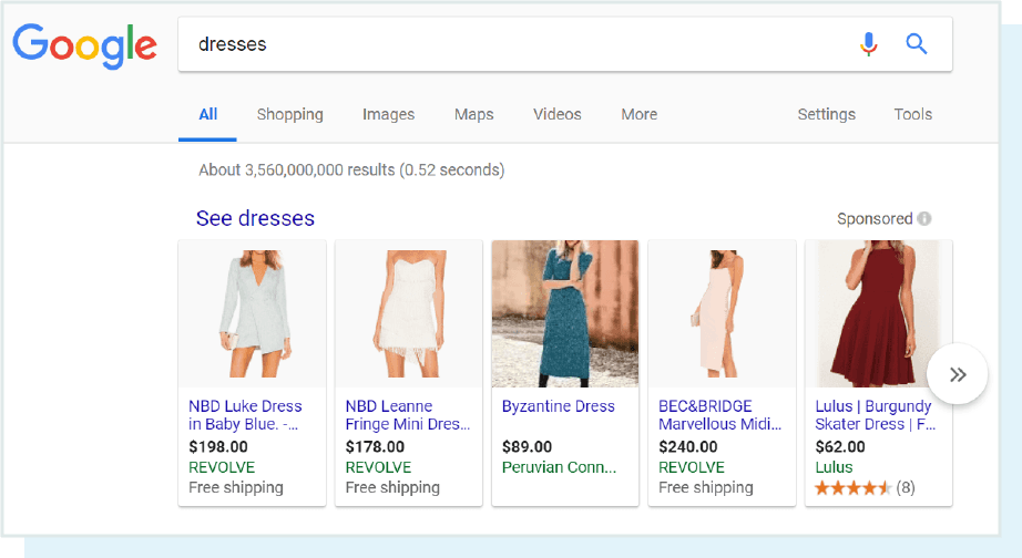 A screenshot of the query 'dresses' and resulting carousel.